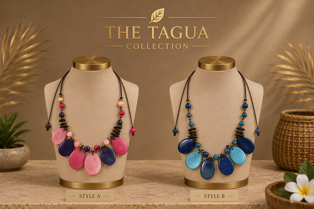 Two beaded statement necklaces displayed on beige jewelry busts against a warm brown backdrop. The left necklace, labeled Style A, features pink and purple teardrop beads with black and pink spacer beads.