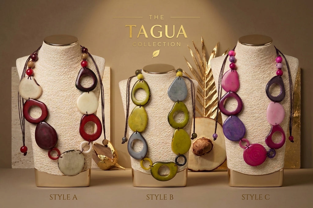 Three necklace styles displayed on textured mannequin busts against a warm beige background. The necklaces feature large circular and oval tagua elements in multiple colors including red, cream, purple, pink, yellow-green, and gray, with dark cords and red beads.